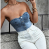 Girl wearing a denim tube top and white jeans
